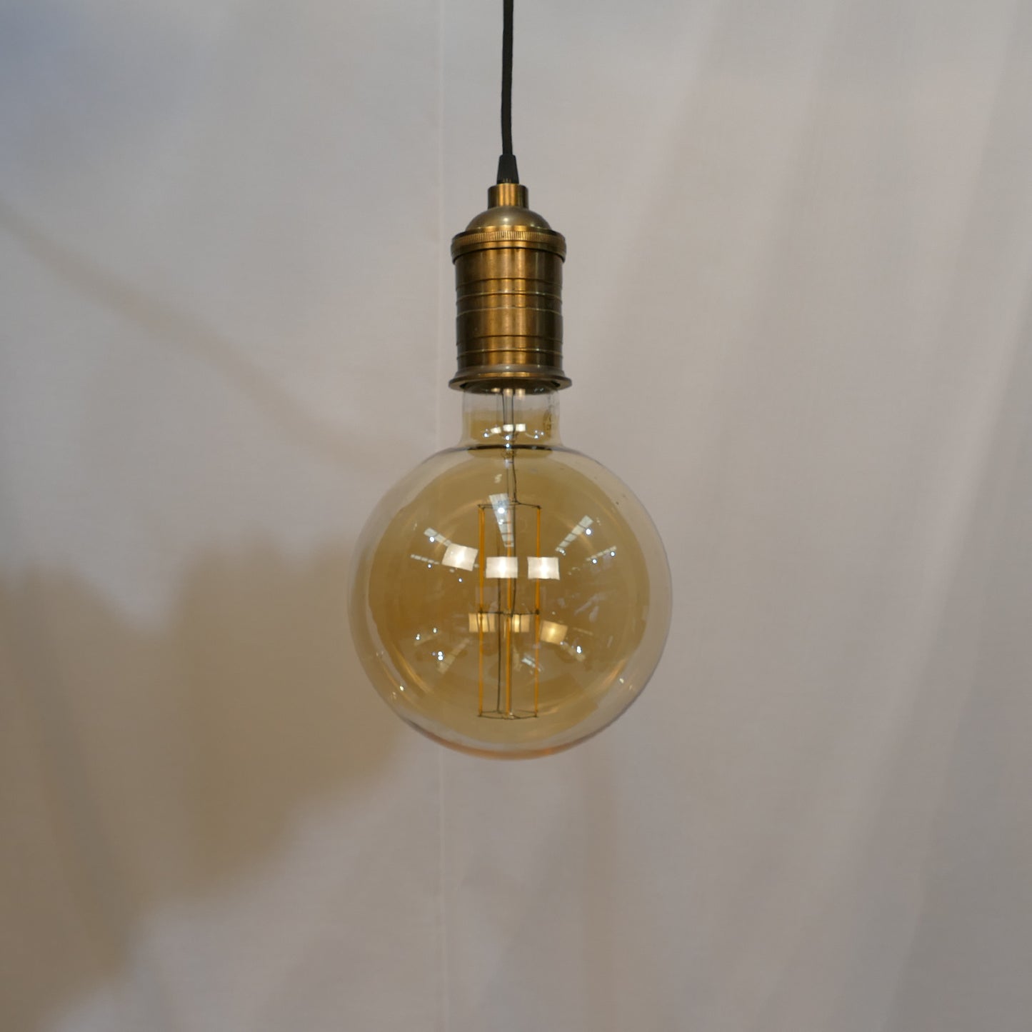 Vintage Brass Pendant with Oversized Amber Bulb